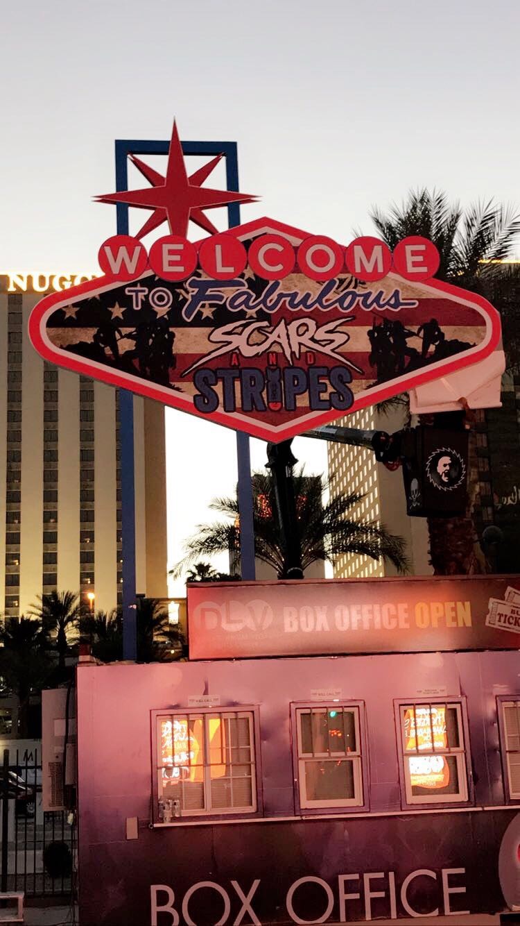Festival box office under a bright sign