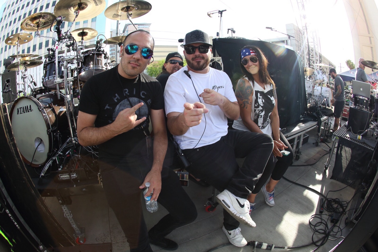 Event crew on stage with drum kit